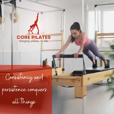 Building strength requires consistency and persistence. Here, a client performs a challenging plank variation on the Reformer, engaging the entire core and upper body.