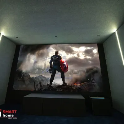 A view of the massive screen in our Madurai project, showcasing the incredible detail and scale of a 4K projection. The minimalist design ensures there are no distractions from the on-screen action.
