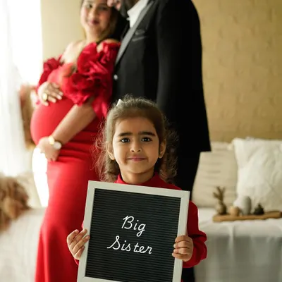 There is nothing sweeter than a promotion to big sister. We love including siblings in our sessions to capture these precious family moments.