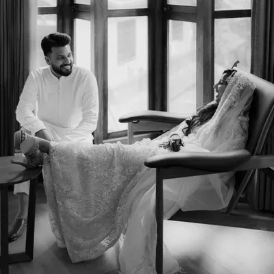 A quiet moment of connection during Sana and Naveed's Nikah. His smile as she rests is a perfect example of the candid, heartfelt interactions I seek to capture, telling a story of comfort and love.