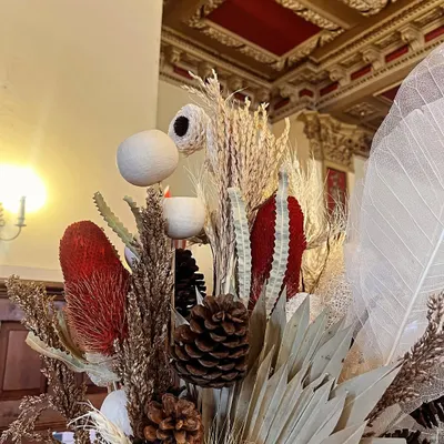 My dry flower arrangements travel the world. This piece made its way to a French aristocratic townhouse in Switzerland, with a brief of classy beiges, impressive reds, and golds to match the decor.