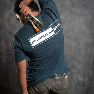 This is me, Shravan, usually covered in paint but always passionate about art! My goal is to share the joy of creating something beautiful with your own hands. Remember the name, Dr. Shravan Arts!