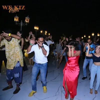A candid click from my birthday night, which was also a Latin party. Here we are doing a fun group animation. It's all about social dancing, expressing yourself, and just having a good time on the dance floor.