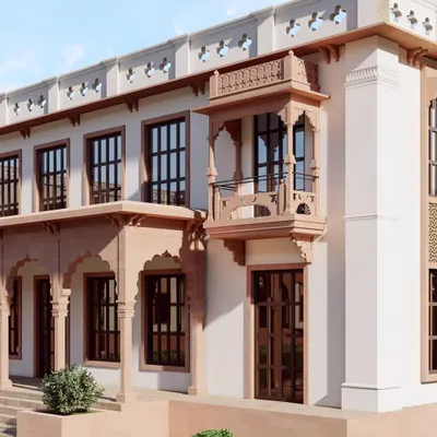 The haveli's exterior showcases a blend of heritage and modernity. Traditional elements like the jharokha balcony and arched colonnade are crafted from local sandstone, set against clean, lime-plastered walls for a timeless architectural statement.