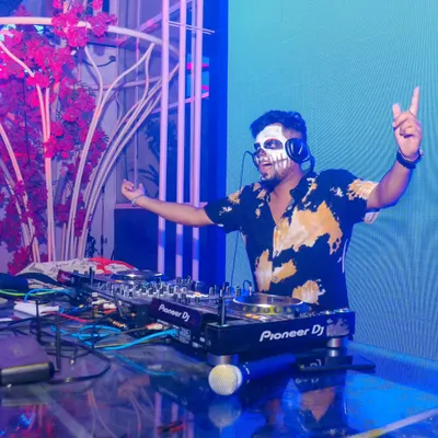 I love bringing a unique vibe to themed events like this Halloween party. Here I am, in full costume, getting the crowd hyped with a spooky season set.