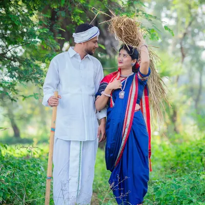 A walk together through the fields, dressed in traditional Shetkari attire. I focus on capturing the natural interactions and shared glances that make these themed shoots feel authentic and heartfelt.