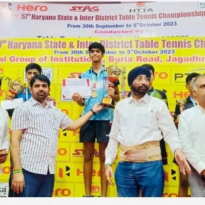 A proud moment for the academy as our player stands on the podium, receiving his gold medal at the 57th Haryana State & Inter-District Table Tennis Championship.