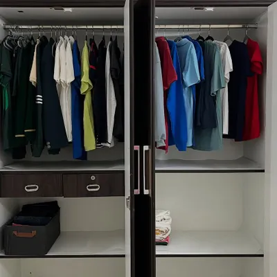 This is the wardrobe of a client who believes in minimalism. With just the right number of clothes, we created a system where every piece has its place, making organization effortless.