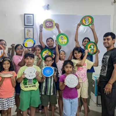 Art is always more fun with friends! A happy group of our young artists showing off the creative plates they designed and painted during a fun-filled workshop in our Noida studio.