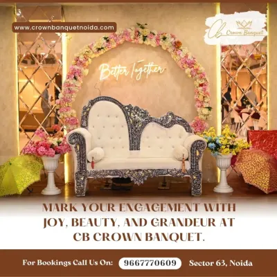 Mark your engagement with grandeur at our venue. This setup showcases our elegant white and silver carved sofa, framed by a beautiful floral arch and a 'Better Together' neon sign against a mirrored wall, creating a picture-perfect backdrop.