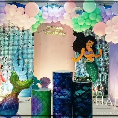 An alternate view of the magical mermaid-themed birthday party. This shot captures the full scope of the enchanting under-the-sea setup.