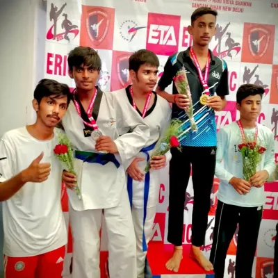 Celebrating another victory. Our students stand proudly on the podium after a successful tournament, showcasing their medals and team spirit.
