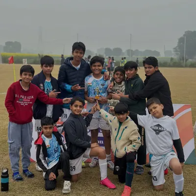 Our U-14 stars celebrating with their tournament trophy. Early success builds a winning mentality for the future.