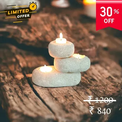 This handmade, stacked stone tea light holder brings a natural, earthy element to your decor. It's perfect for creating a focal point of calm on a wooden table or shelf, especially with its limited-time offer.