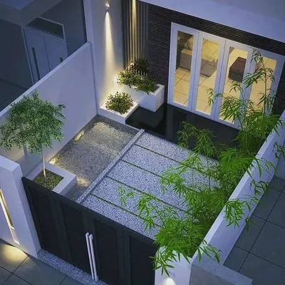 This is a top-down view of a landscape design for a compact entryway. My plan incorporates a mix of paving, gravel, and designated planting areas with bamboo and a small tree to create a modern and welcoming entrance.