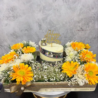 Big celebrations call for beautiful gestures. Our 'Celebration Cake Tray' features a custom cake surrounded by fresh, vibrant flowers, creating a stunning centerpiece for any birthday or anniversary.