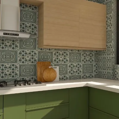This kitchen design uses a beautiful combination of materials. We've paired green laminate cabinets with light wood overhead units, a white quartz countertop, and vibrant Moroccan tiles for the backsplash to create a unique and stylish look.