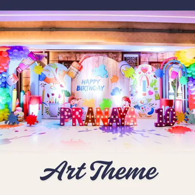 An Art Attack party is a canvas of pure fun. This theme features a vibrant backdrop with giant paintbrushes, colorful splatters, and personalized marquee letters, setting the stage for a day of creative celebration.
