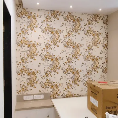 A classic floral wallpaper adds timeless charm to this wall. I ensure the pattern repeats seamlessly and make precise cutouts for electrical outlets.