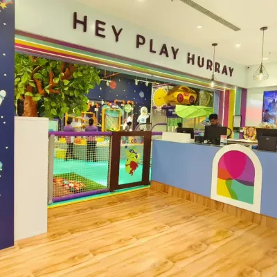 Hey, Play, Hurray! This is the view that greets you at Kaboom. Our bright, clean, and welcoming space is designed from top to bottom to be a haven of fun and creativity for your family.