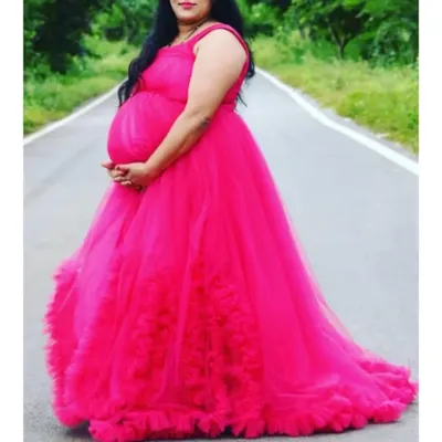 I designed this flowing pink maternity gown for a photoshoot. It's made with soft tulle to be comfortable and create a beautiful silhouette.