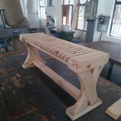 This elegant slatted bench, crafted by our students, showcases their ability to execute a design from concept to a fully functional, polished product.