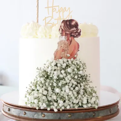 One of my most popular designs! This elegant cake features a beautiful illustration of a woman whose dress is made from a cascade of fresh baby's breath. It's so simple and so stunning.