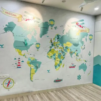For this child's room, I paired a light wood floor with a custom world map wallpaper. The durable, easy-to-clean floor is perfect for a playroom, while the overall design sparks imagination and adventure.