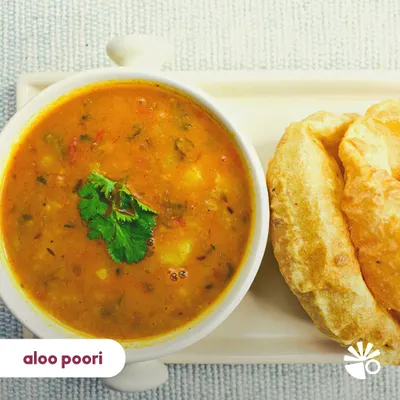 Serving up a plateful of joy with my piping hot Aloo Poori. The pooris are crispy and fluffy, and the aloo sabzi is packed with simple, comforting flavors. 🤤
