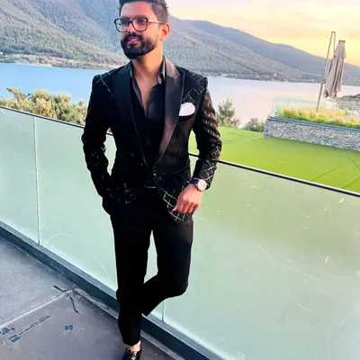 Dressed to impress for a grand event in Bodrum, Turkey. A sharp black suit is always a classic choice for an elegant evening.