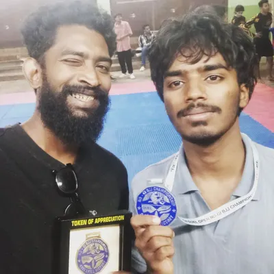 A proud moment with my student Dhanush after he secured a silver medal at the Duel Grappling Championship. He fought hard into overtime for the gold, showing incredible heart and technical skill.