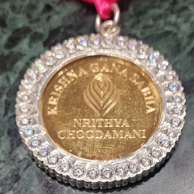 The 'Nrithya Choodamani' gold medallion from the prestigious Krishna Gana Sabha, Chennai.