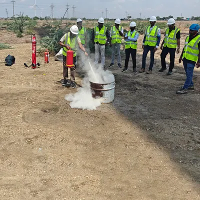 A practical fire safety drill in progress at one of our project sites. Our teams are regularly trained on emergency response procedures, including the correct use of fire extinguishers, to ensure they are equipped to handle any situation with confidence.