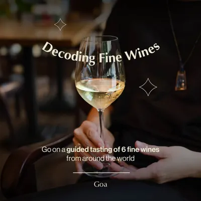 A promotional image for our "Decoding Fine Wines" experience in Goa. This workshop offers a guided tasting of six different wines, helping you understand and appreciate the complexities of each glass.