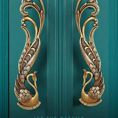 Let the details do the talking. These peacock-inspired brass door pulls are a perfect example of our heritage craftsmanship, designed to turn any entrance into a work of art.