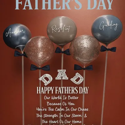 A heartfelt tribute to Dad. This custom acrylic board features personalized balloons describing him as our "Anchor," "Resilient," and "Guiding" force, all set in a bed of baby's breath.