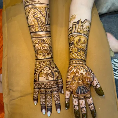 This is the full mehndi design for the groom, Bhavin. It tells his story, including London where he met his bride, a yacht, their engagement, and Ram-Sita for blessings.