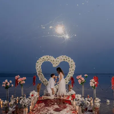 The perfect surprise proposal, complete with fireworks and a heart of flowers on the water. I specialize in capturing these once in a lifetime moments, ensuring the surprise, joy, and romantic setup are remembered forever.