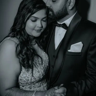 A timeless black and white portrait from a sangeet night. This intimate shot captures the elegance and deep affection between the couple amidst the celebration.