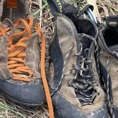 A pair of well-loved, well-worn La Sportiva climbing shoes. This is the gear that connects us to the rock and carries us violência our adventures.