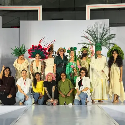 The full team and our incredible models after our relaunch show. Our vision was clear: to work with brands that take sustainability seriously and to create hair art inspired by nature.