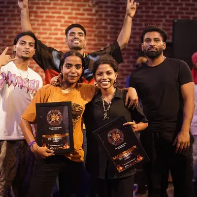 The winners of the B-girl battle at our Hiphop Elements Jam, posing with the judges. We celebrate the champions and create opportunities for female dancers to lead the scene.