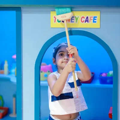Time to clean up at the Tooney Cafe. Pretend play helps children learn responsibility and social skills in a fun, imaginative way.