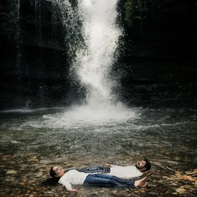 This is the kind of magic I love to create. For adventurous couples, I find unique locations like this secluded waterfall to capture breathtaking, cinematic moments that feel like they are straight out of a movie.