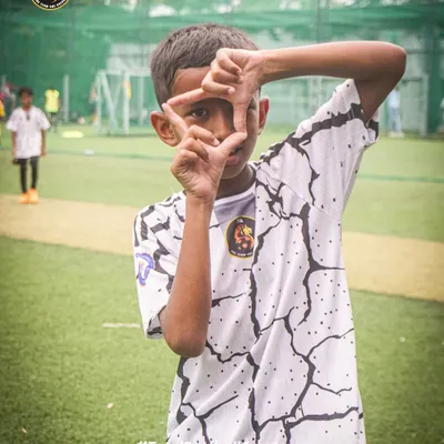 Framing the future. A player shows his confidence and love for the game.