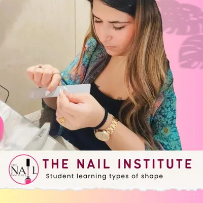 The perfect manicure starts with the perfect shape. Here, a student is learning how to file and shape nails, from almond to coffin.