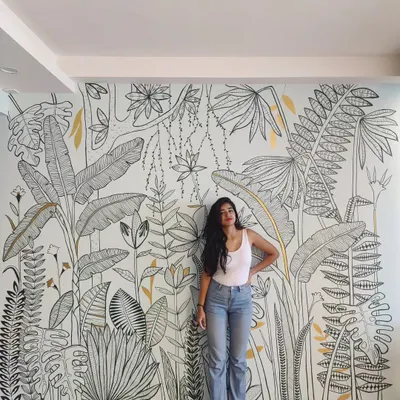 A full view of this black and white tropical mural, designed to make a statement. Standing next to the finished piece is always a grateful moment.