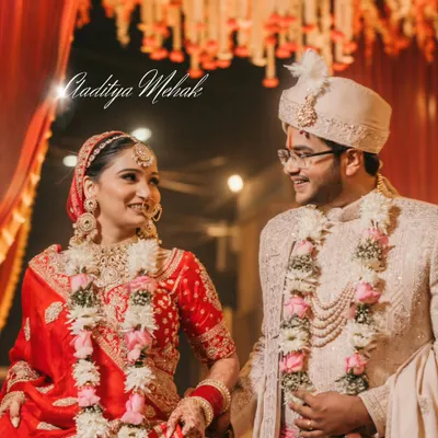 The moment right after the Varmala ceremony. The look of pure joy and love shared between Aaditya and Mehak is what makes a wedding day so magical. We capture these priceless, fleeting expressions.