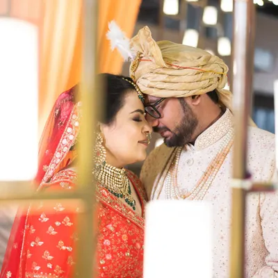 An intimate moment between the bride and groom, framed by soft light. This is the quiet poetry I seek to capture on a wedding day.