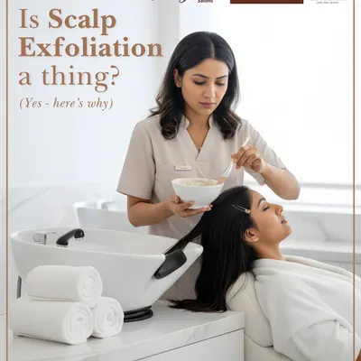 Is scalp exfoliation a thing? Yes, and here's why. This image shows our expert applying a scalp treatment, a crucial step for removing buildup and promoting healthy hair growth.